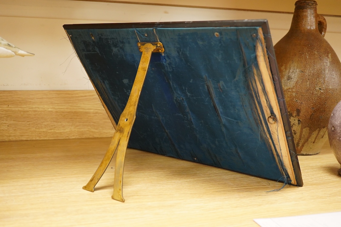 A Viennese strut mirror with inlaid metal detail, marked verso ‘Fr. Rosenberg Wien Graben 17’, 43 x 31cm